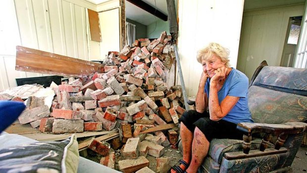 "We are very fortunate"  ... Jan Currie in what remains of the dining area of her 100-year-old house.