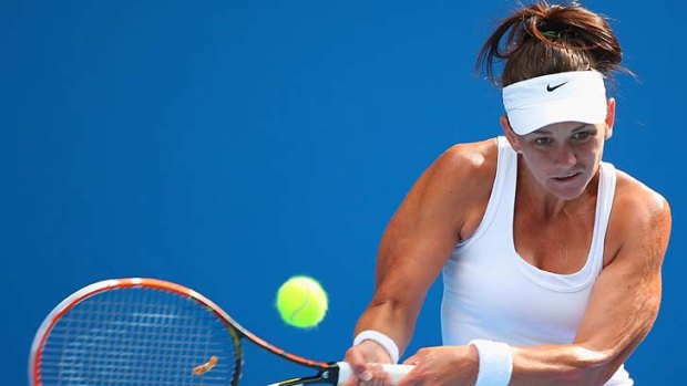 Casey Dellacqua has reached the third round at Melbourne Park.