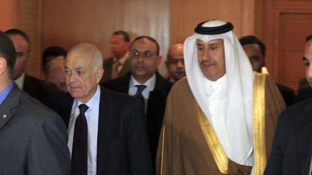"The bloodshed hasn't stopped" ... Qatar Foreign Minister, Sheikh Hamad bin Jassim al Thani, right, with Arab League Secretary-General, Nabil Elaraby.