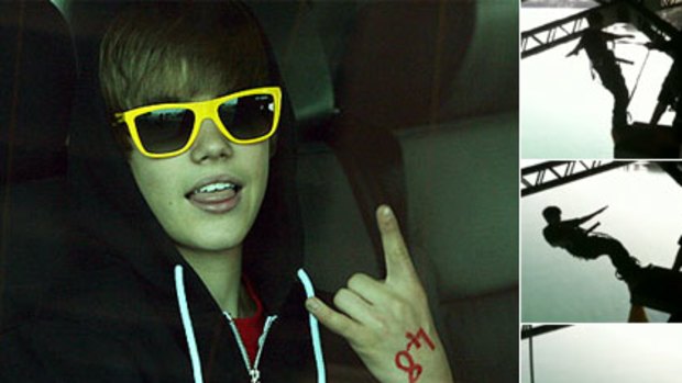 "Dangerous creature" ... Justin Bieber leaves the Auckland Harbour Bridge after his bungy jump, above, and stills from a video he posted on Twitter.