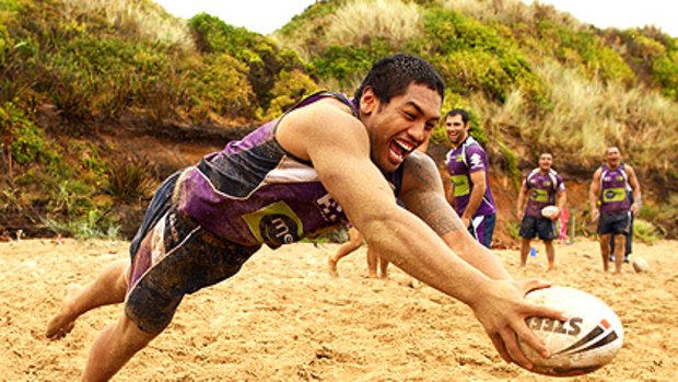 Louis Fanene dives for a try in a Melbourne Storm training session at Anglesea yesterday.