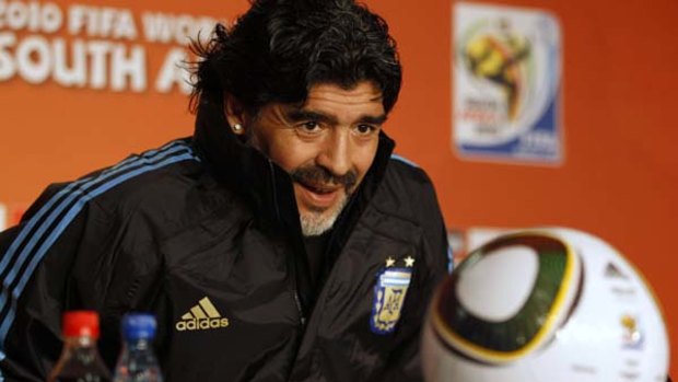 Diego Maradona ... believes God will help get his team over the line.