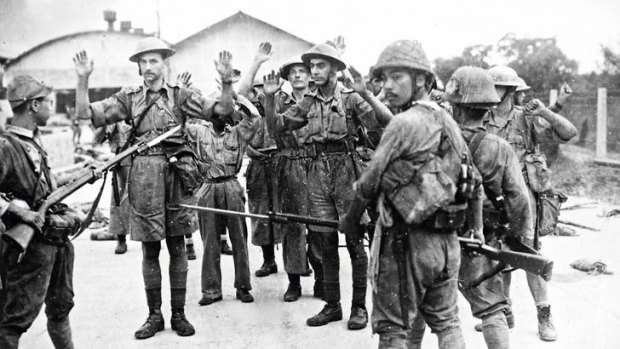 After the fall … Commonwealth troops surrender to Japanese soldiers in Singapore, 1942.