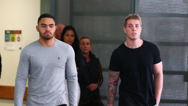 Rabbitohs players Dylan Walker and Aaron Gray, pictured leaving hospital in the wake of the overdose.