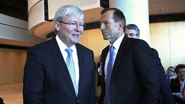 Not looking: Kevin Rudd and Tony Abbott avoid eye contact at the opening last month of the ASIO headquarters in Canberra.