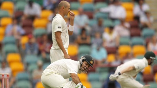 Making haste ... Ricky Ponting scampers between wickets during his defiant half-century against New Zealand at the Gabba yesterday. Earlier, the ex-skipper was culpable for the run-out of Usman Khawaja.