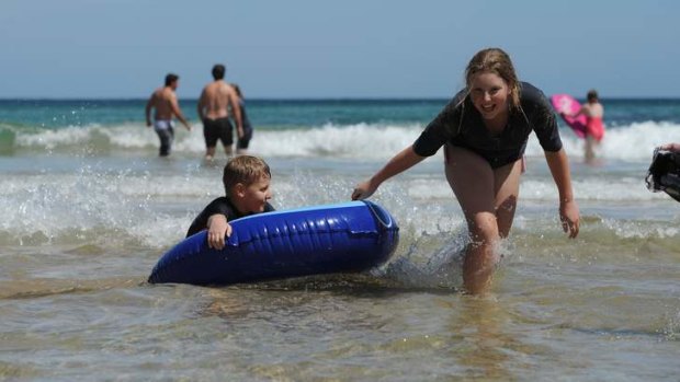 Enjoying the surf at South Broulee are Jacob, 10 and Claudia Kos, 11, from Deakin.