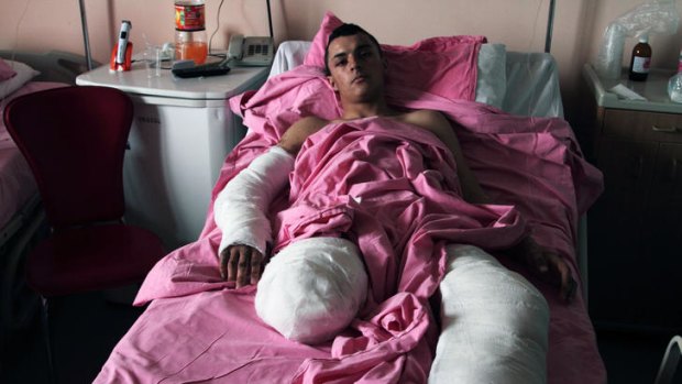 Syrian singer Muhammad Ibrahim, 18, lies in a Turkish hospital, a casualty of the Syrian army shell attack on his group of anti-Assad protesters last month.
