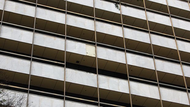 The concrete panel dislodged, taking a section of safety railing with it.