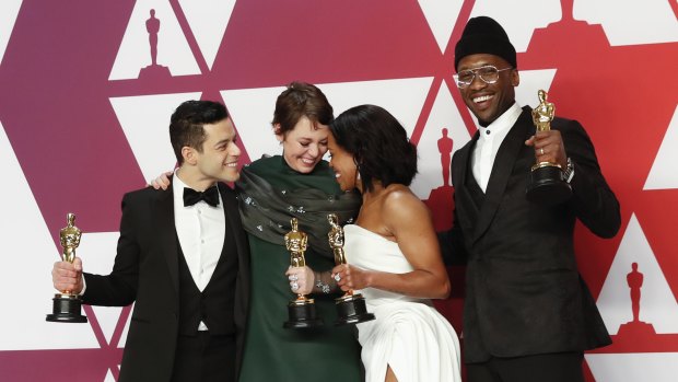 Acting Oscar winners ... Rami Malek (left) with Olivia Colman, Regina King and Mahershala Ali.