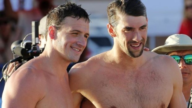 Michael Phelps (right) and Ryan Lochte after competing in the 100-metre butterfly final during the Arena Grand Prix swim meet, in Arizona.