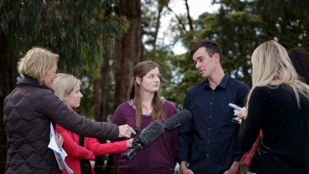 Mitchell and Ella Tromp talk to the media.