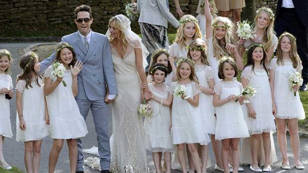 Newlyweds Kate Moss, her rock star husband Jamie Hince, and their flowergirls.
