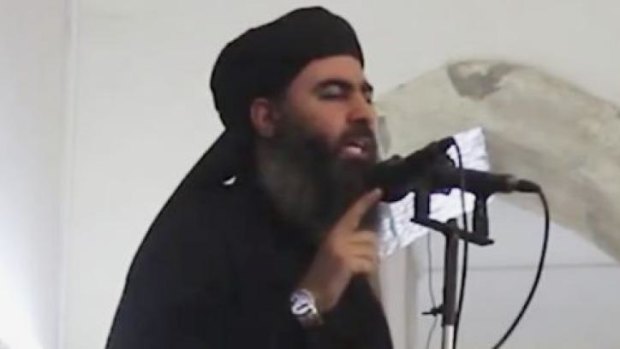 Islamist leader Abu Bakr al-Baghdadi delivering a sermon at a mosque in Iraq.