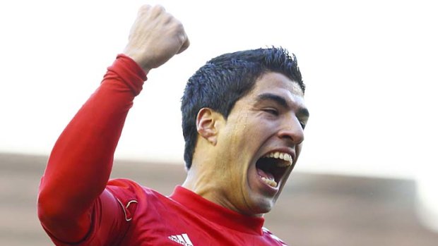 Liverpool's Luis Suarez celebrates.