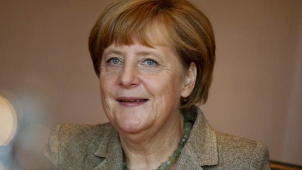 German Chancellor Angela Merkel has said NATO will honour an agreement on troop levels with Russia.