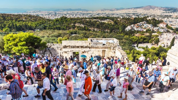 Tourists entering Acropolis of Athens.