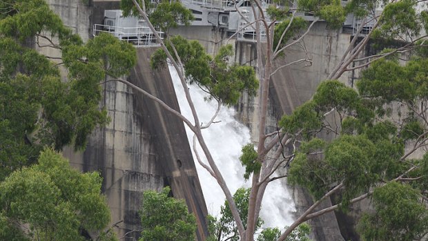Water is released today from Warragamba Dam before it reaches capacity by midnight.