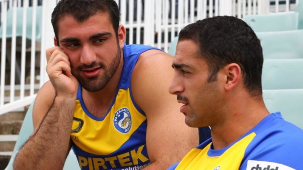 Heart to heart: Elkin talked with Tim Mannah (left) on the day News Corp papers reported a possible link between the death of Jon Mannah from cancer and peptide use.