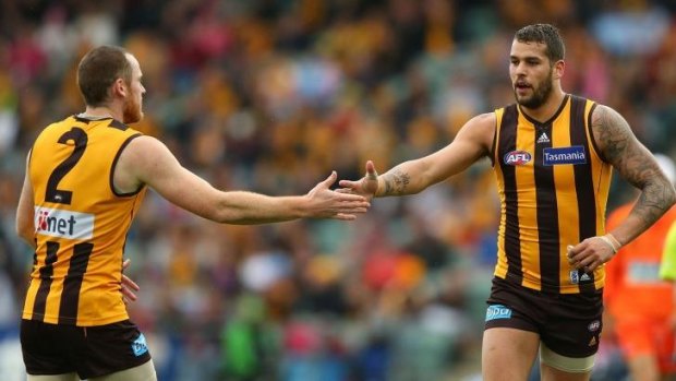 Lance Franklin (right) celebrates a goal with Jarryd Roughead during a round 14 match against the Brisbane Lions on June 30, 2013. A lot of water has flowed under the bridge since then.