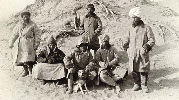 Aurel Stein, with his dog Dash, poses in the desert during his second expedition into China. He returned with what is now acknowledged as the world's oldest printed book, the Diamond Sutra of 868AD.
