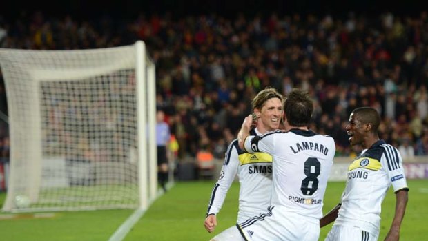 At last: Fernando Torres celebrates with Frank Lampard and Ramires.