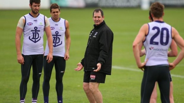 Work to do: Ross Lyon puts Fremantle players through their paces.