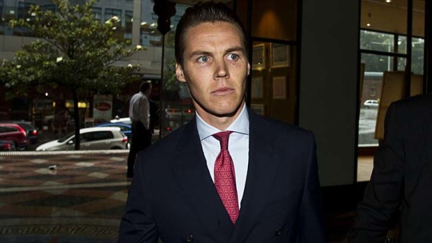 Accused: Oliver Curtis arrives at the Downing Centre Local Court.