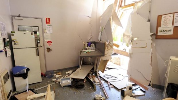 Damage to the Greenway Vinnies staff lunch room after a vehicle smashed through the exterior wall. 