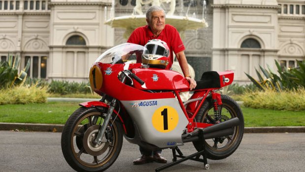 Two-wheel legend: Giacomo Agostini with a replica of an MV Augusta racing bike.