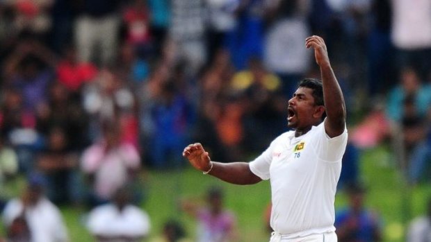 Rangana Herath celebrates a wicket in Colombo.