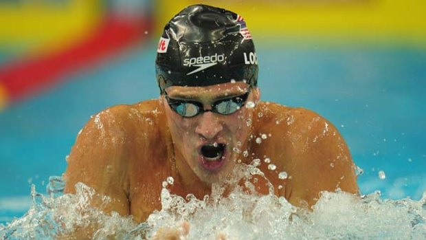 Ryan Lochte of USA powers his way to the gold medal in   the 400m individual medley.