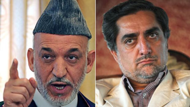 Afghan President Hamid Karzai and right, Presidential candidate Abdullah Abdullah.