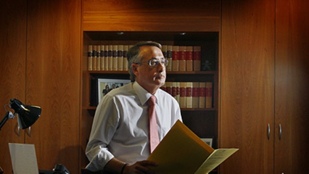 Tough decisions necessary ... Wayne Swan in his office at the Treasury building in Canberra.