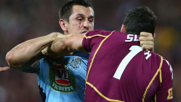 Extras: Mitchell Pearce and Billy Slater get to grips.