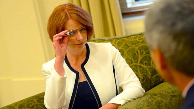 Prime Minister Julia Gillard tests out Google Glass.
