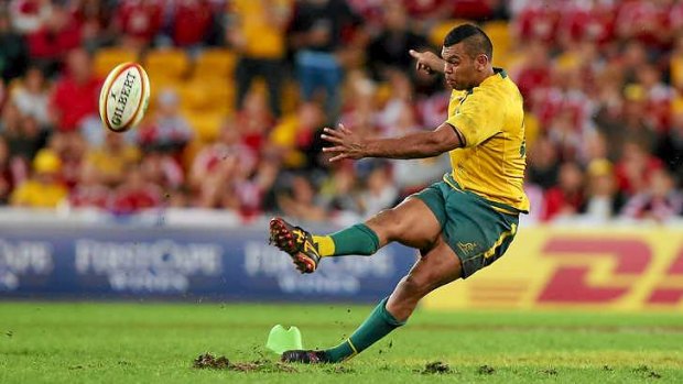 Why didn't James O'Connor take this kick?: Kurtley Beale slips at the vital moment of the first Test against the British and Irish Lions.