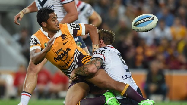 BRISBANE, AUSTRALIA - SEPTEMBER 25:  Anthony Milford of the Broncos offloads in the tackle during the NRL First Preliminary Final match between the Brisbane Broncos and the Sydney Roosters at Suncorp Stadium on September 25, 2015 in Brisbane, Australia.  (Photo by Matt Roberts/Getty Images)