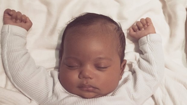 The first photo of Saint West, son of Kim Kardashian and Kanye West. 
