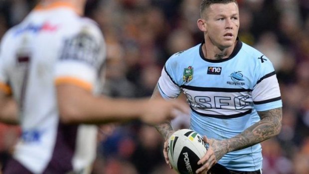 Juvenile behaviour: Cronulla five-eighth Todd Carney in what became his last match for the Sharks against Brisbane on Friday night.