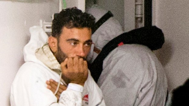 Mohammed Ali Malek waits to disembark after the boat capsized off the coast of Libya, killing 700.