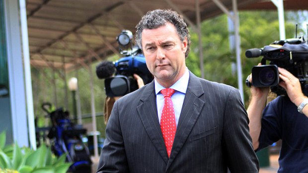 John-Paul Langbroek fronts the media at Redland Bay yesterday.