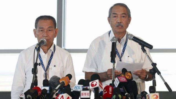 Payouts to passengers: Malaysia Airlines chief executive Ahmad Jauhari Yahya (left) and chairman Mohamed Nor Yusof speak to media.