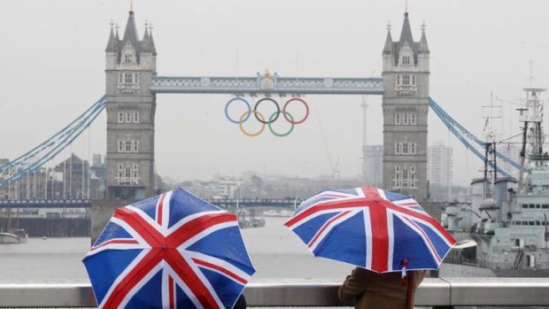 UK tourism's English summer: Tower Bridge adorned with the Olympic rings in 2012.