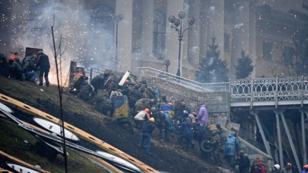 Protesters battle with police in Independence Square, Kiev, on Thursday, shattering the fragile truce called by President Victor Yanukovych.