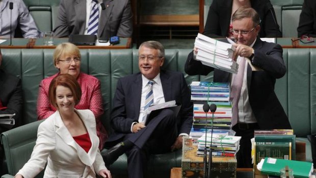 Boxed in ... Prime Minister Julia Gillard watches Leader of the House Anthony Albanese table a box of documents during question time yesterday.