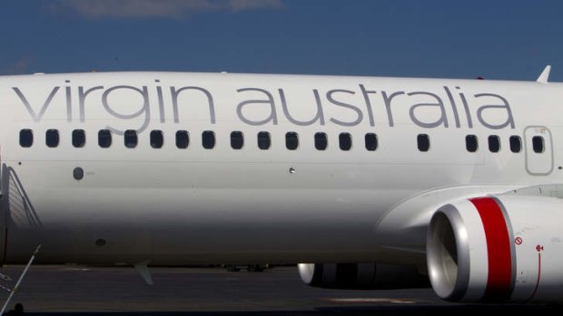 Back to normal: Virgin Australia has reduced its domestic seating for the third consecutive month.