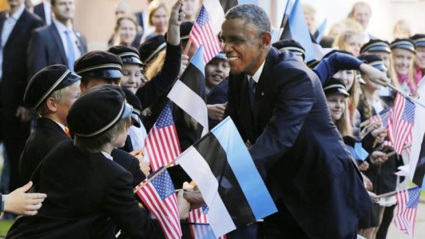 Popular visit ... US President Barack Obama shakes hands with school children at Kadriorg Palace in Tallinn, Estonia.