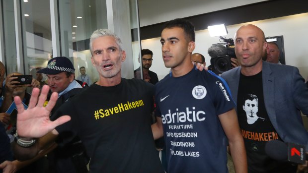 Craig Foster with refugee footballer Hakeem al-Araibi at Melbourne International Airport on February 12.