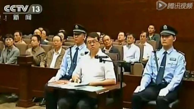 Composed ... Wang Lijun in court today.